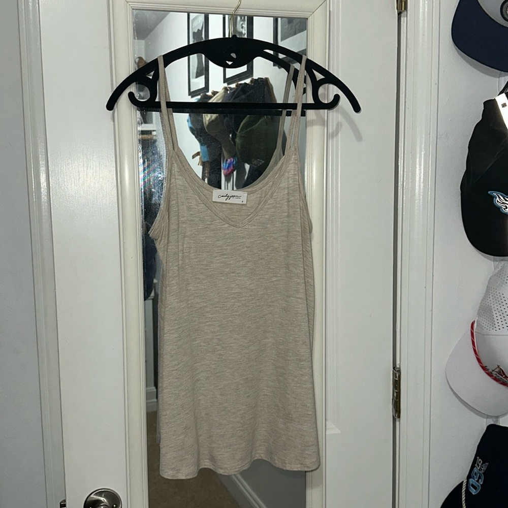 CJ’s favorite spaghetti strap tank